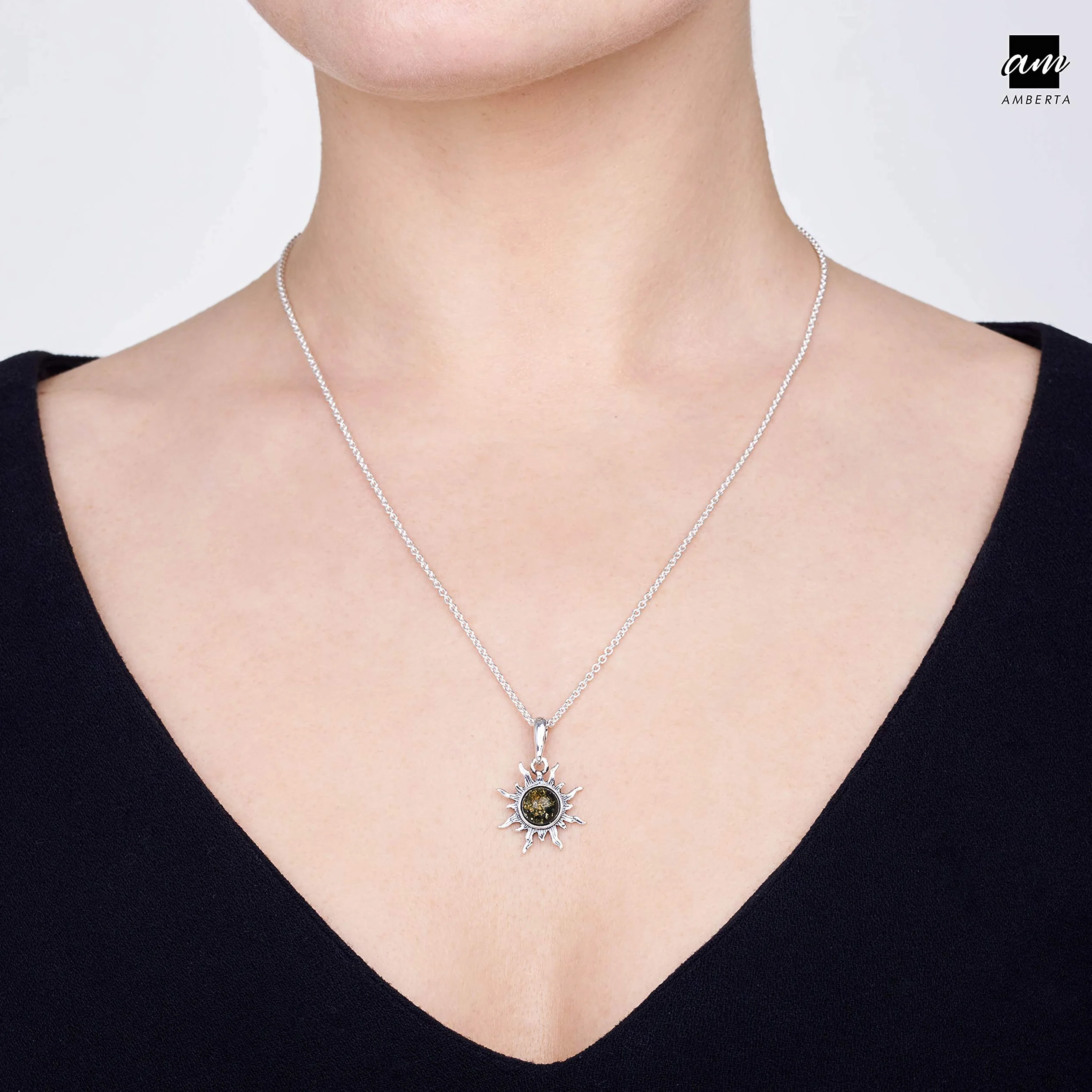 Amberta - Wisiorek z bursztynem bałtyckim, w kształcie słońca, ze srebra wysokiej próby 925, 2.7 cm, Srebro próby 925; żywica; srebro; metal, Bursztyn