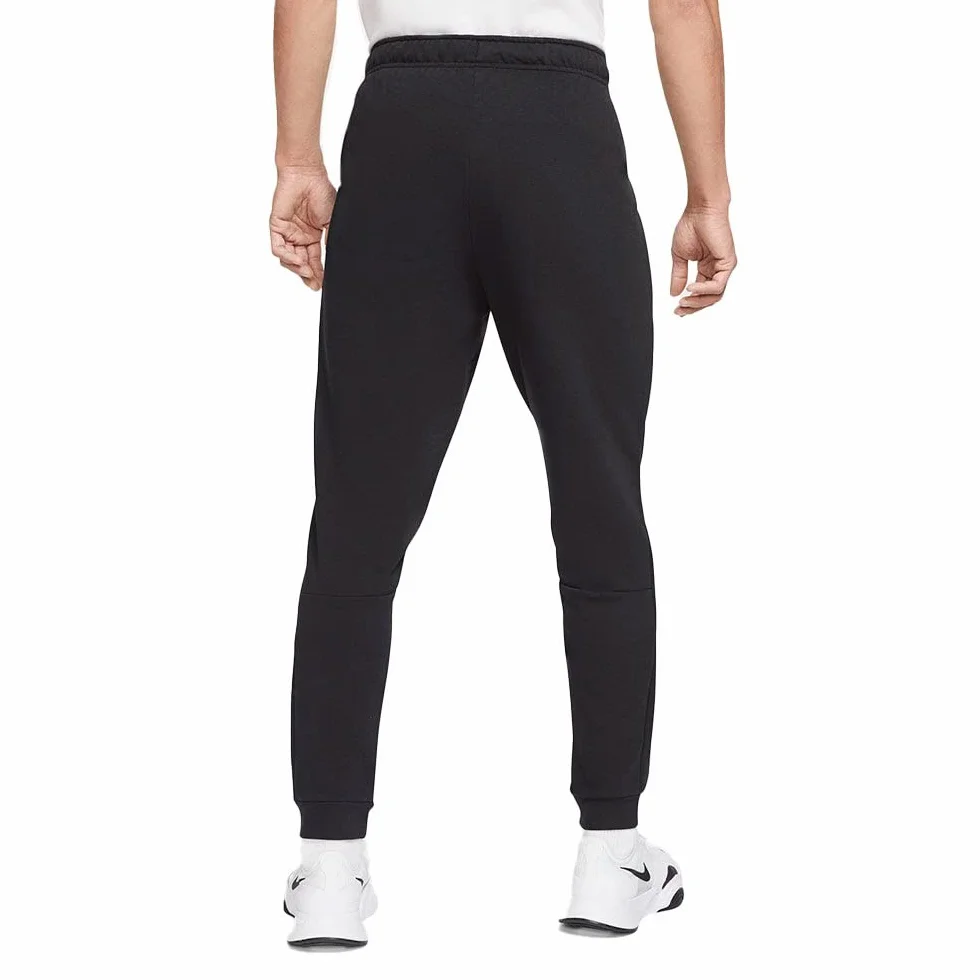 Nike M NK DF PNT TAPER FL - Spodnie kompresyjne Mężczyźni