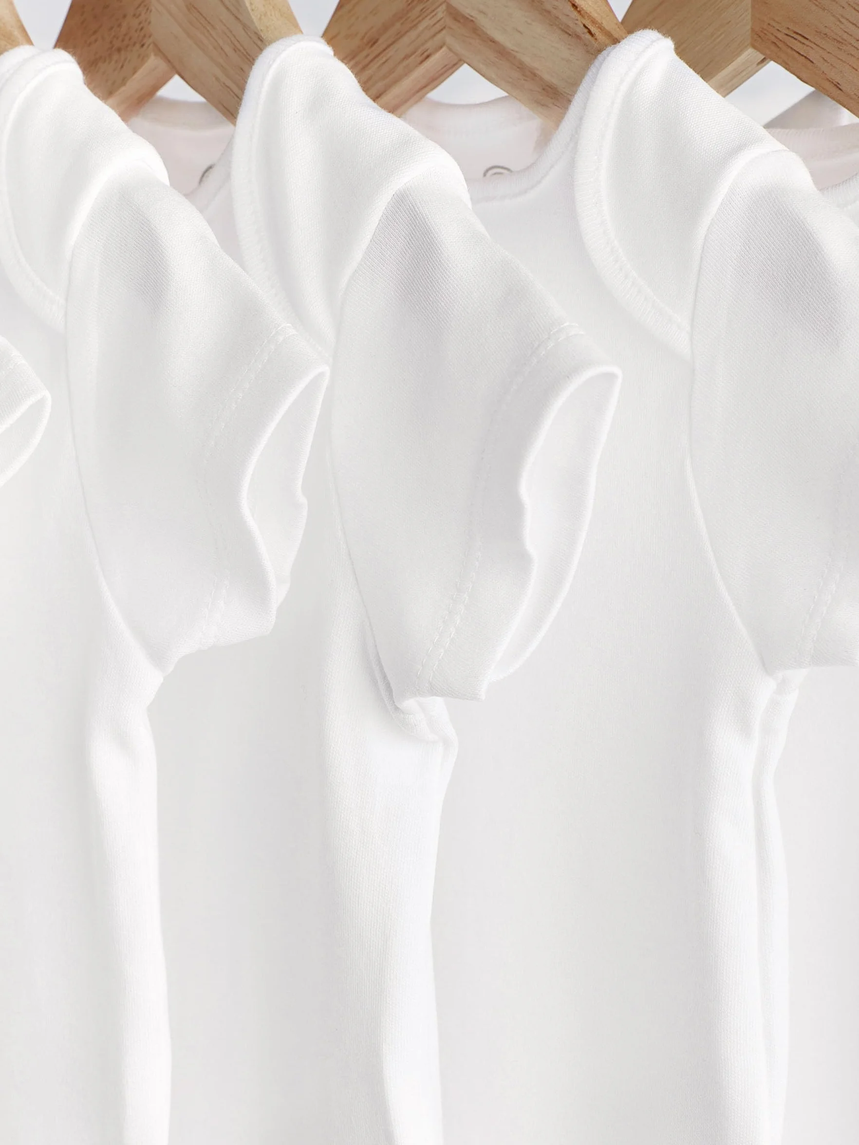 NEXT Noworodki unisex Zestaw 7 niemowlęcych body z krótkim rękawem
