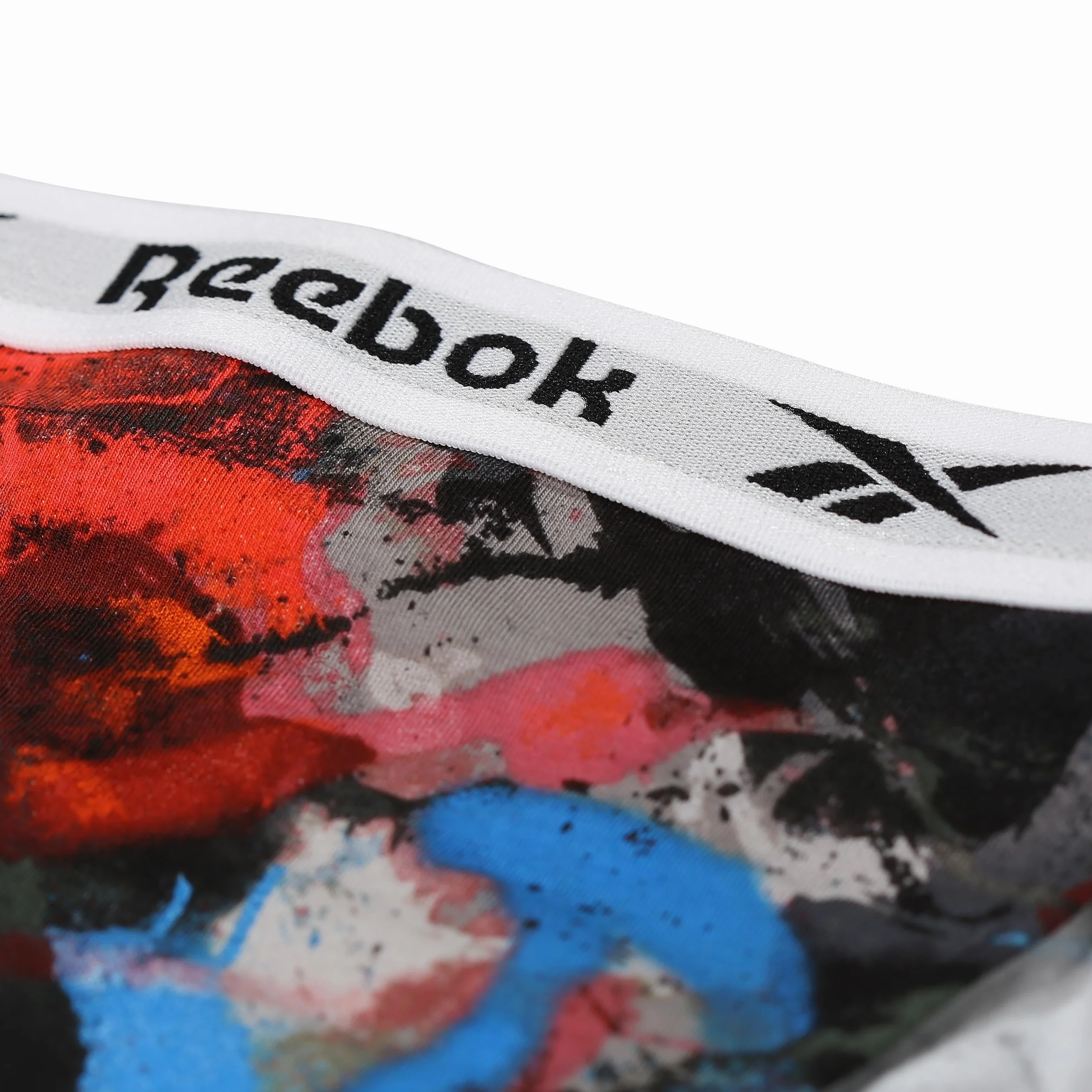 Reebok Figi Kobiety Damskie Majtki Reebok Tanga W Kolorze Pomarańczowym/Nadrukowym/Niebieskim - Opakowanie Zbiorcze 3 Sztuk