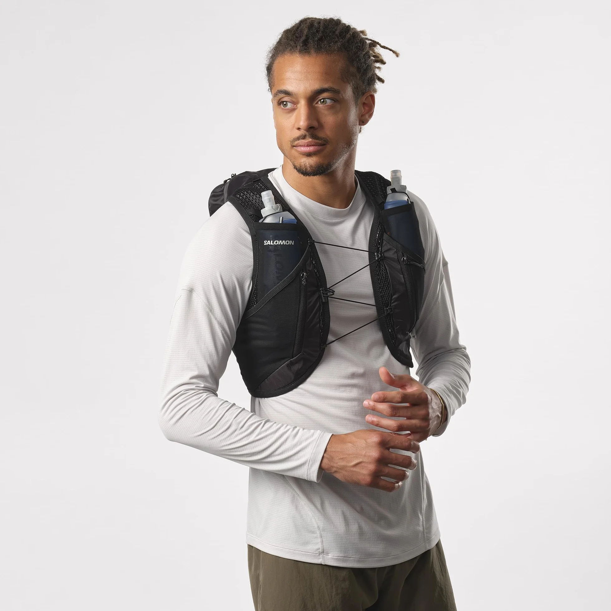 Salomon Active Skin 12 Unisex kamizelka do biegania szlak turystyczny z butelkami w zestawie, 12 l, łatwe nawodnienie, precyzyjne dopasowanie i zoptymalizowane przechowywanie, czarna, S