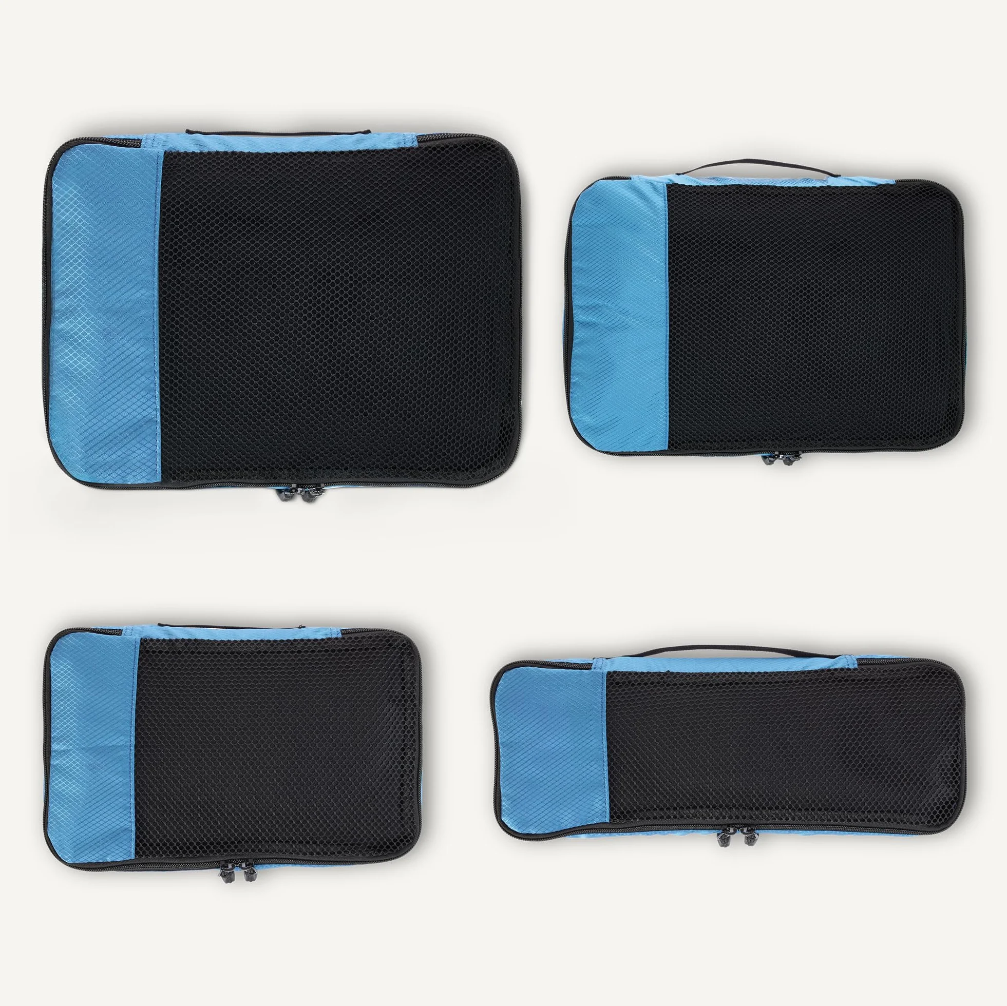 Amazon Essentials 4 Cz. Zestaw Akcesoriów Podróżnych do Pakowania, Organizer na Bagaż z Podwójnym Zamkiem, Klapa Górna z Siatki, 100% Poliester, Mały/Śr./Duży/Slim, Błękitny (Wcześniej Amazon Basics)