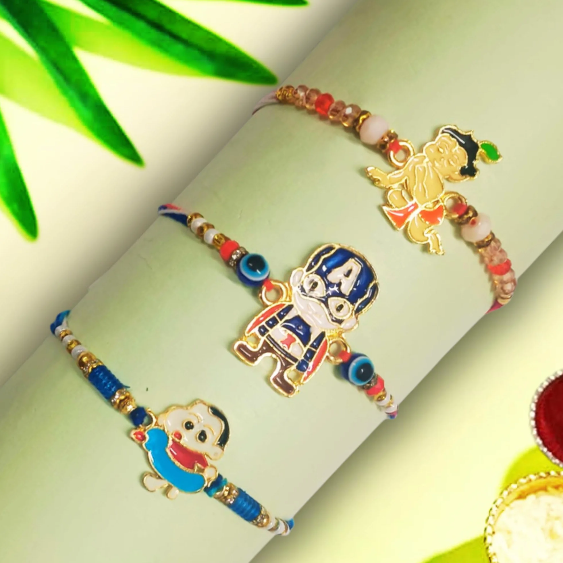 Dzieci Rakhi i postać z kreskówki, designerskie metalowe rakhi z Roli Chawal + kartka z życzeniami zestaw 3 sztuk, M, bez kamieni szlachetnych, Medium, Bez kamienia szlachetnego