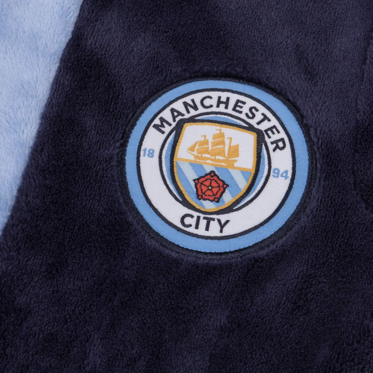 Manchester City F.C. - Szlafrok chłopięcy z kapturem - polarowy - oficjalne gadżety i akcesoria piłkarskie