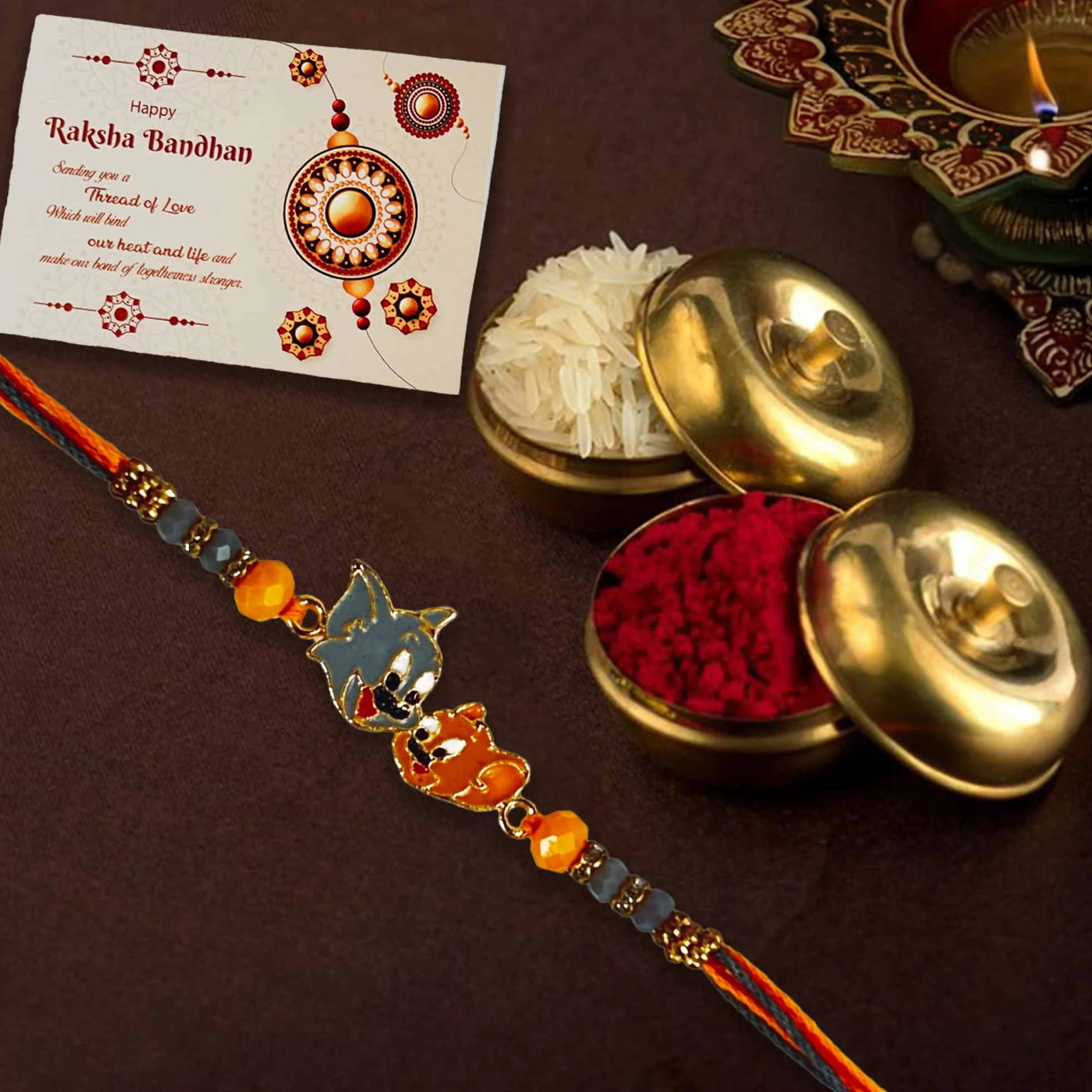 Dzieci Rakhi i postać z kreskówki, designerskie metalowe rakhi z Roli Chawal + kartka z życzeniami zestaw 3 sztuk, M, bez kamieni szlachetnych, Medium, Bez kamienia szlachetnego
